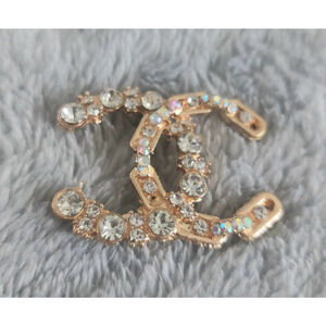 Women's gold and clear iridescent rhinestones Brooch 2 inches